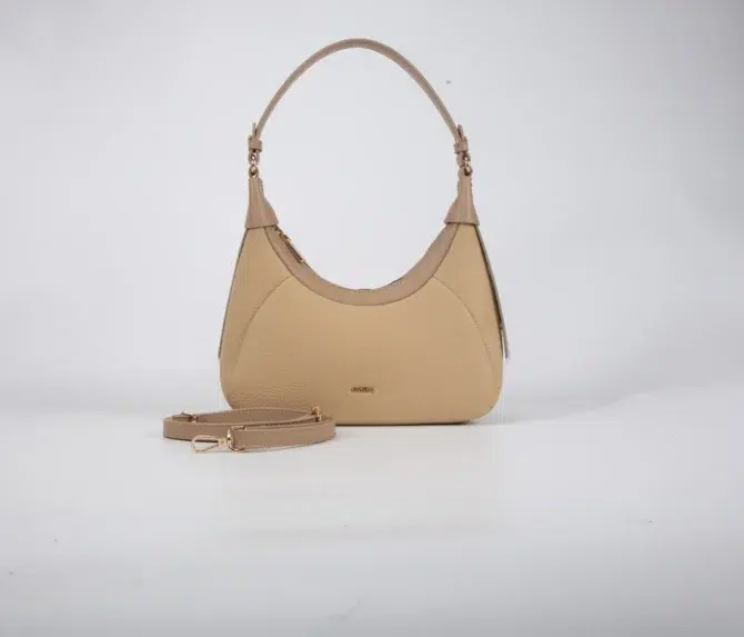 A petite women's handbag with an elegant design - beige